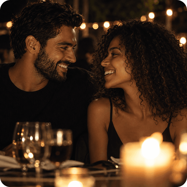 A couple connecting over a candlelit dinner